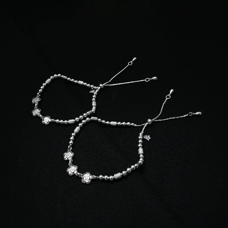 anklets for casual wear for women-Silver Anklet with Three Flower Motifs and Beaded Detailing.