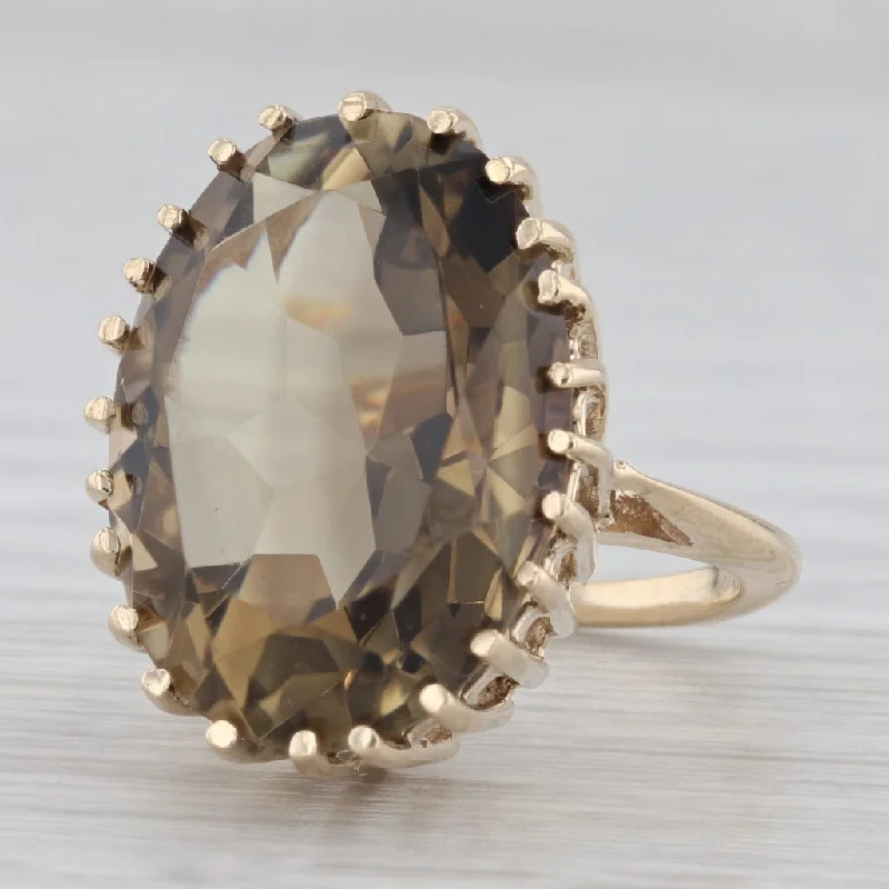 round brilliant cut engagement rings for women-11.80ct Oval Solitaire Smoky Quartz Ring 10k Yellow Gold Size 4