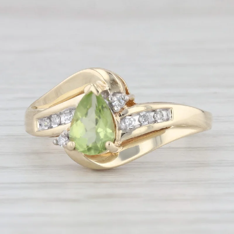 custom-made engagement rings for women-0.79ctw Pear Peridot Diamond Bypass Ring 10k Yellow Gold Size 7