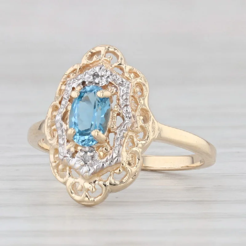 affordable vintage engagement rings for women-0.60ct Oval Blue Topaz Ring 10k Yellow Gold Size 6 Diamond Accents